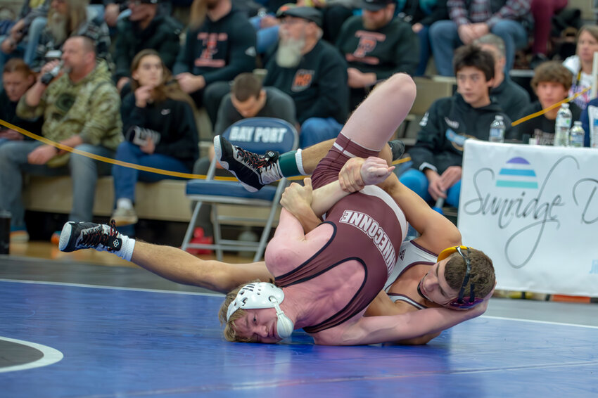 Luxemburg-Casco's Max Ronsman was in control of this matchup with Winneconne's Tyler Engelke from the opening buzzer. Josh Staloch photo