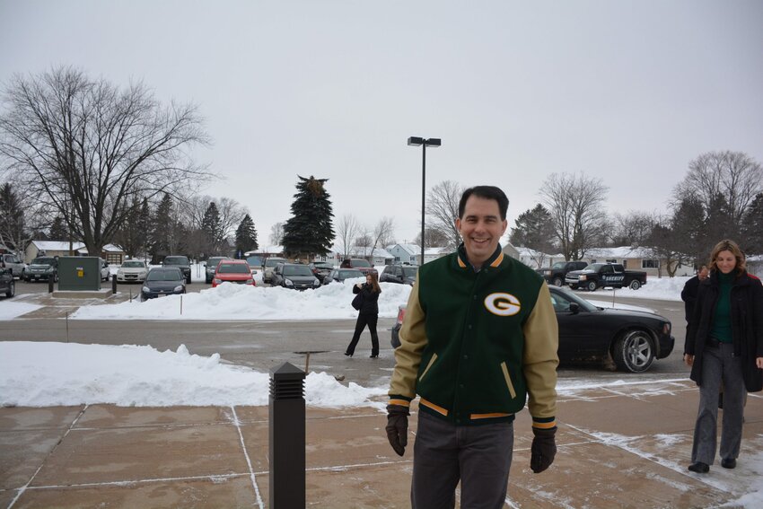 Gov. Scott Walker arrives at the Kewaunee County Administration building for a town hall meeting Thursday, Jan. 14.