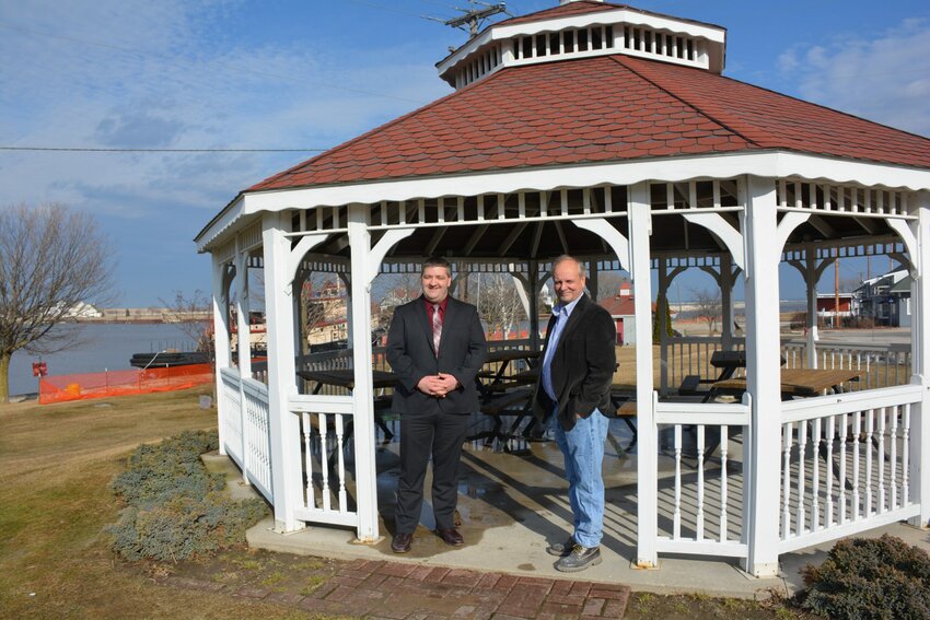 Kyle Ellefson, Kewaunee city administrator, left, and Mayor John Blaha stand in the Harbor Park gazebo, which will be moved closer to the water as part of the Kewaunee Harbor revitalization project.