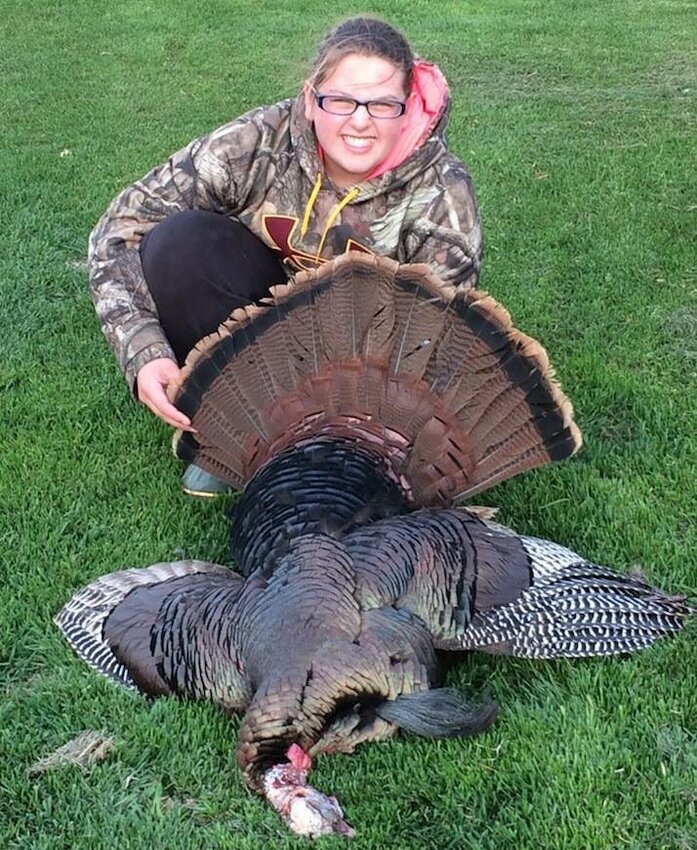 Bailey Davister, 11, mentored by her grandfather, Paul Wallace, shot this gobbler at 6 a.m. May 7 in Kewaunee County. After sitting for less than an hour, they were able to call it in to 25 yards.