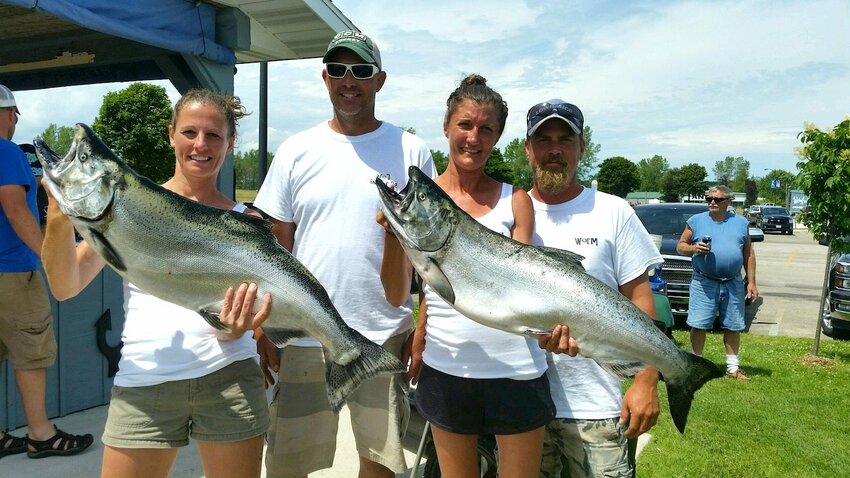 Ann Smith, John Meyer, Mark Lee and Heather Last teamed up to win the Kewaunee Offshore Challenge fishing contest.