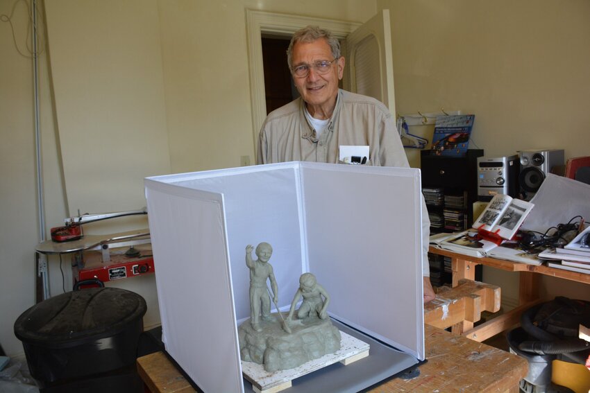 Dr. William Faller is creating a bronze sculpture of Native American boys fishing to represent the importance of clean water.