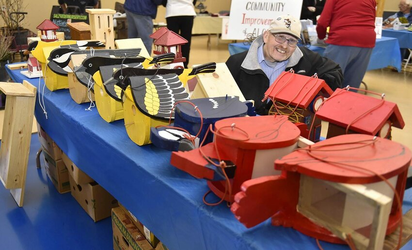 Paul Pflughoeft of Algoma sells handcrafted bird houses in different designs in the vendor area.