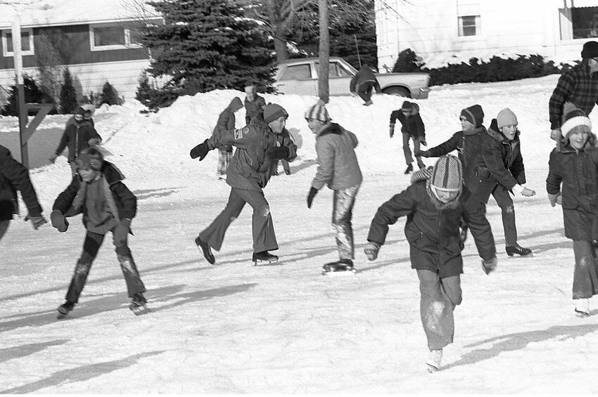 SNAPSHOT IN TIME: Kewaunee kids were having a good time skating at Haney Park on the day Harold Heidmann stopped to snap the photo. One hundred or more years ago, kids and adults delighted in skating frozen rivers, creeks and ponds. Skating on the Ahnapee River was fairly good in December 1911 when George Zeimer flooded a large tract of land to build a rink near his Sixth Street home in Algoma. Zeimer’s smooth, clean rink was an attraction. Heidmann’s photos can be found at Algoma Public Library.