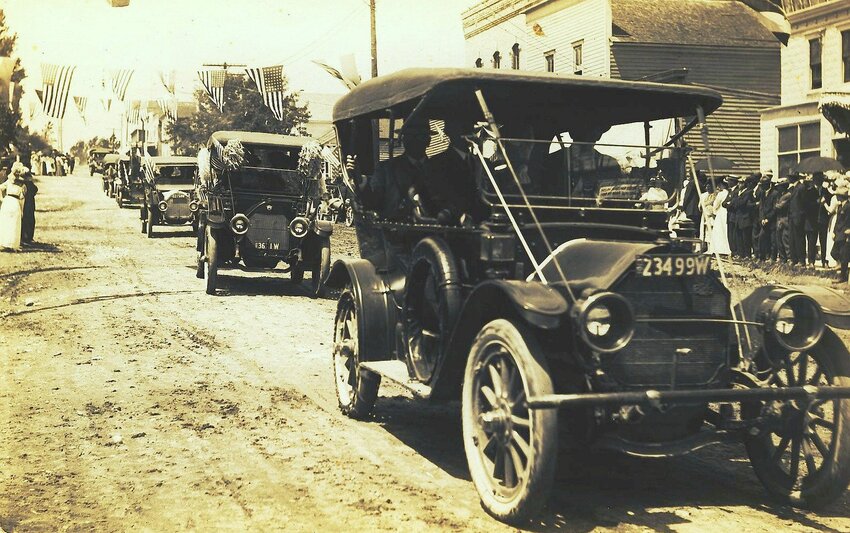 SNAPSHOT IN TIME: Kewaunee residents turned out for this Fourth of July parade, presumably in 1912, as the picture appears on a Farmers Bank postcard postmarked 1913.</p><p>County transportation was still dependent on the horse, but automobiles were making inroads. As the photo attests, there were plenty of autos around Kewaunee at the time, perhaps purchased at Dishmaker Brothers, the local agent for Ford automobiles. The wise knew the newfangled machines would never replace the horse, which could travel in any kind of weather, so they said. However, the populace turned out to see the auto display on that July 4, a day when the city streets were in perfect driving condition.</p><p>The photo is from the Kannerwurf, Sharpe, Johnson Collection at the Algoma Public Library.