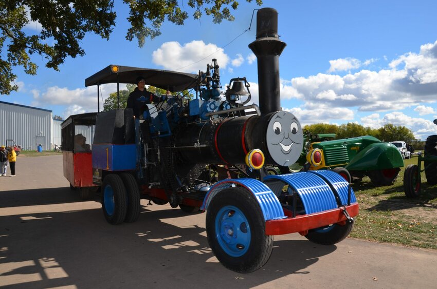 A steam engine wagon provided by the Rabas family gives rides to visitors to last year's Agricultural Heritage Days. The steam wagon will return to this year's event.