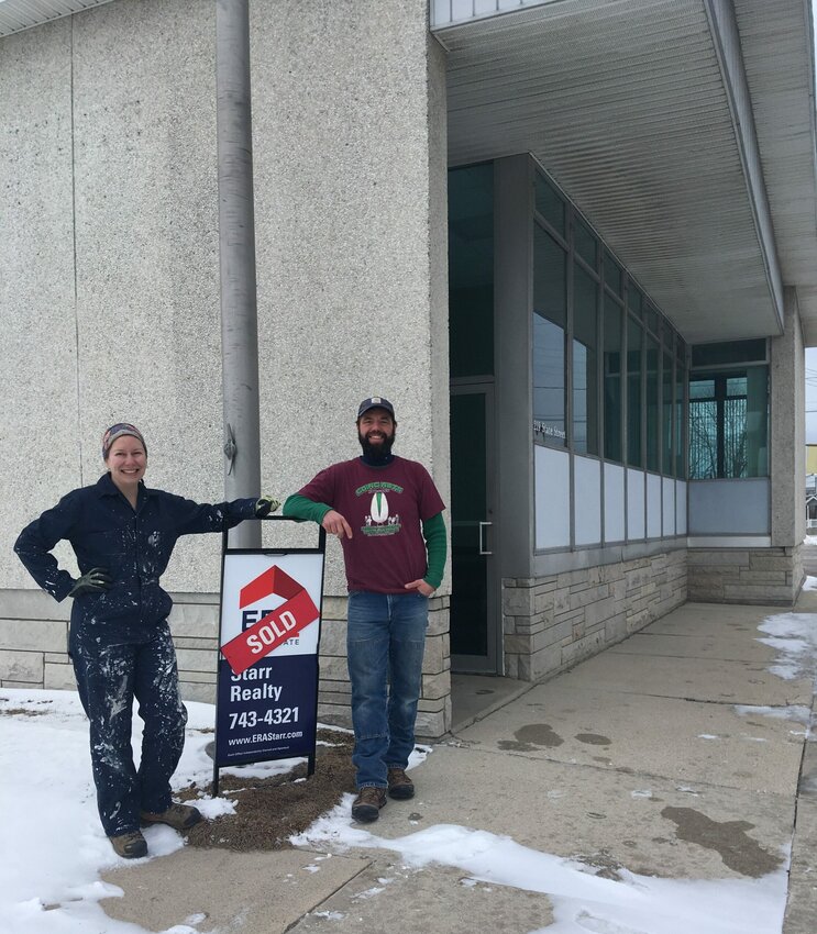 Kendra Bulgrin and Jimmy Eddings outside their the James May North gallery and events space in the former Algoma Post Office building at 219 Steele St.