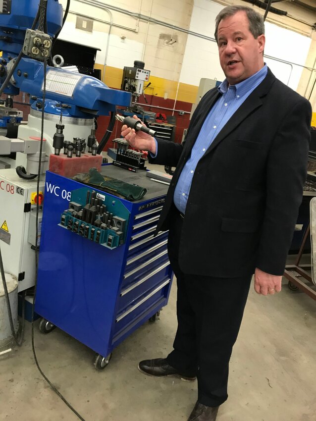 Luxemburg-Casco School District Superintendent Glenn Schlender points out equipment upgrades in the school's metal fabrication shop that came about as part of the school's $27.8 million renovation project in this 2020 photo. Schlender will retire from the post at the end of this school year after eight years as L-C superintendent.