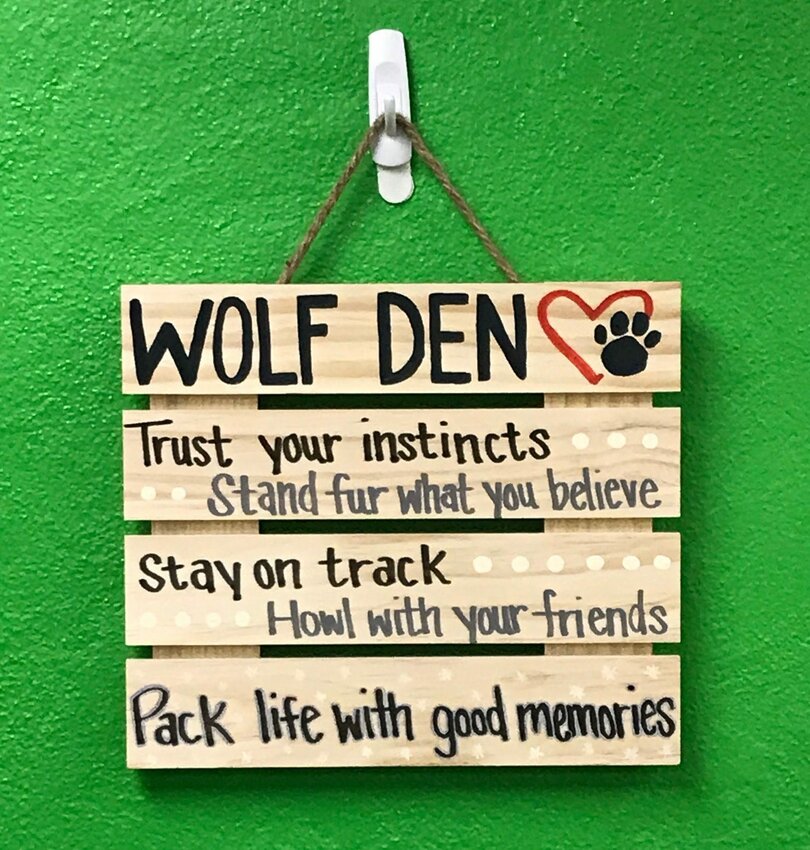 One of several signs at a Wolf Den gathering, a one-on-one student-run program  in the Algoma School District that matches high school "Wolves" (Algoma's school mascot) as mentors to "Pups" in the younger schools who may need help figuring out their skills and how to use them. The program is one facet of the Live Algoma community wellness initiative that earned the community an All-America City Award from the National Civic League.