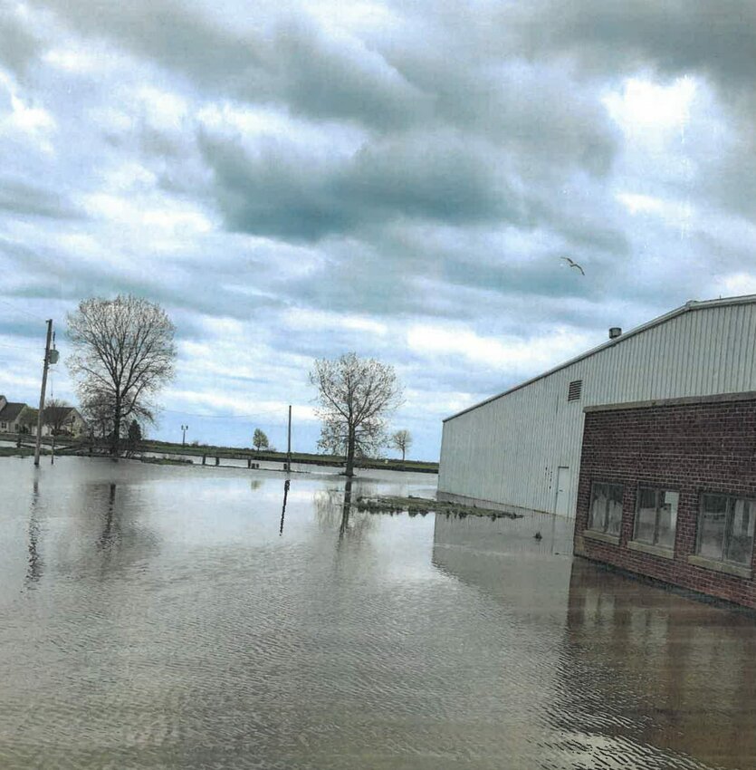 Flood waters surround the steel building at the tip of Fisherman's Point in the Kewaunee harbor last year. It's one of three blighted properties the city of Kewaunee acquired under a Community Development Block Grant to improve the property for redevelopment, and a new $150,000 grant from the Wisconsin Department of Administration will be used for environmental clean-up and site restoration for blight elimination at the three sites.