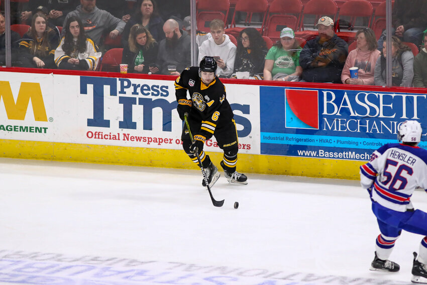 Green Bay Gamblers Forward Peter Kramer dangles the puck in a game against Team USA