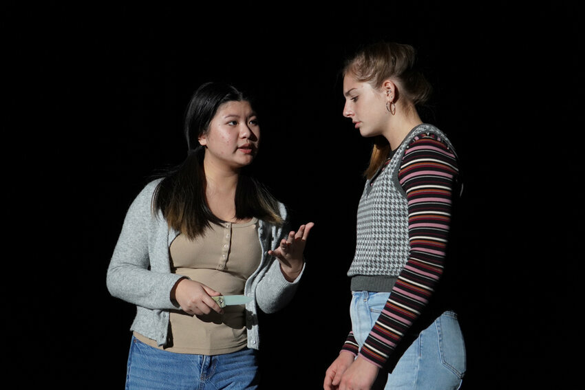 Two students on stage