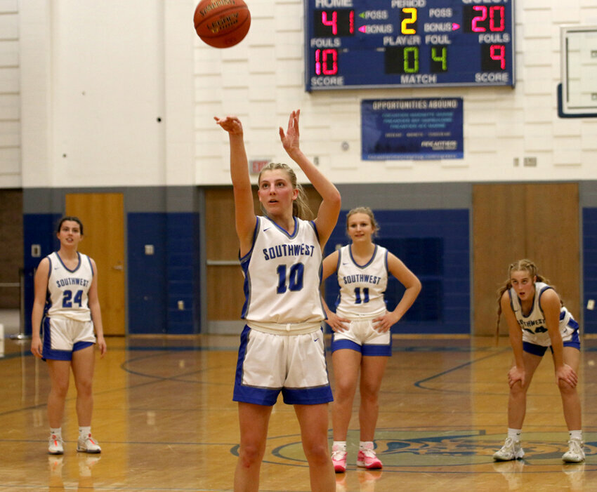 Addison Pytleski shoots her final point to get her to her career 1,000 on a free throw in their game against Pulaski on Friday, Dec. 15. The final score was 42-20. Janelle Fisher photos