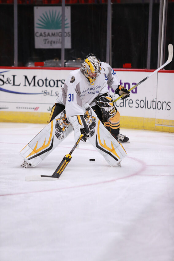 Green Bay Gamblers Goalie Adam Gajan warms up before the Gamblers' game against the Chicago Steel 