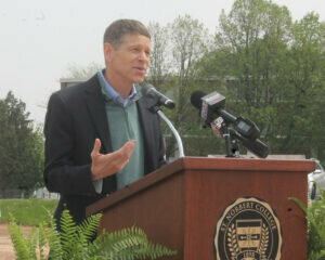 Donald & Patricia Schneider's son, Paul, addresses the crowd at the May 13 groundbreaking held on the St. Norbert College campus. Kris Leonhardt photo