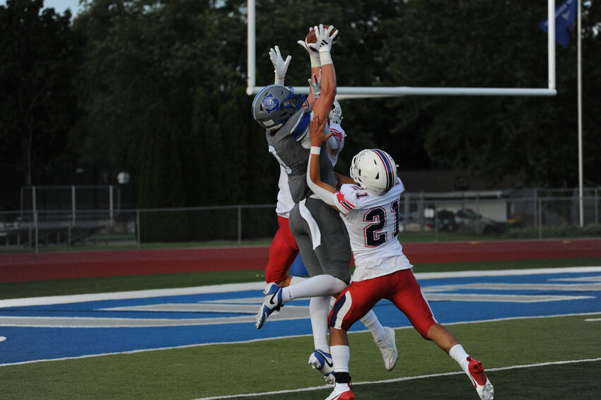 Southwest Trojan Wide Receiver Braxton Murphy snatches a longball from quarterback Daniel Stevens out of the air for a completion in their 28-21 loss to Appleton East.