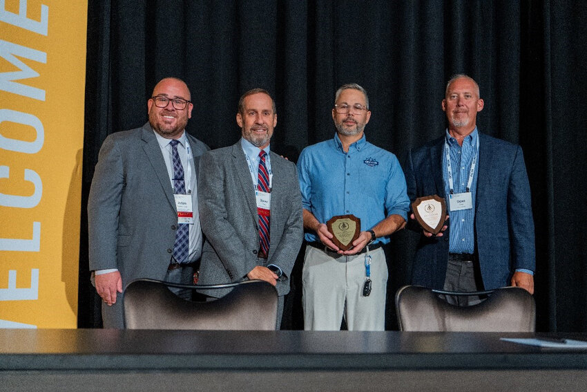 From left, Adam Tindall-Schlicht, administrator, Great Lakes St. Lawrence Seaway Development Corporation; Steve Fisher, executive director, American Great Lakes Ports Association; Erik A. Varela, executive director, Illinois International Port District; and Dean Haen, director, Port of Green Bay during the Pacesetter Award Ceremony held during the AGLPA 2024 Annual Conference on Aug. 9, in Chicago, Ill.