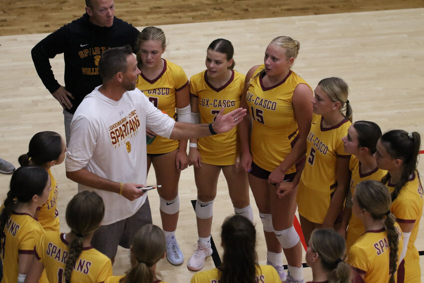 The Luxemburg-Casco volleyball team regroups during the Beast of the Northeast, held Aug. 30 at the Champion Center, Appleton.