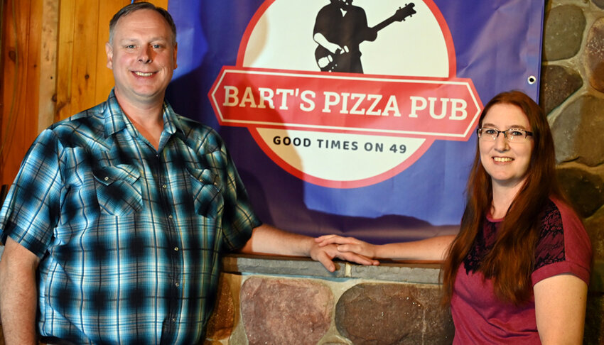 Andrew and Becky Bartlet get ready to open Bart's Pizza Pub after buying Northland Sports Bar and Grill in Iola..Emily Conroy Photo