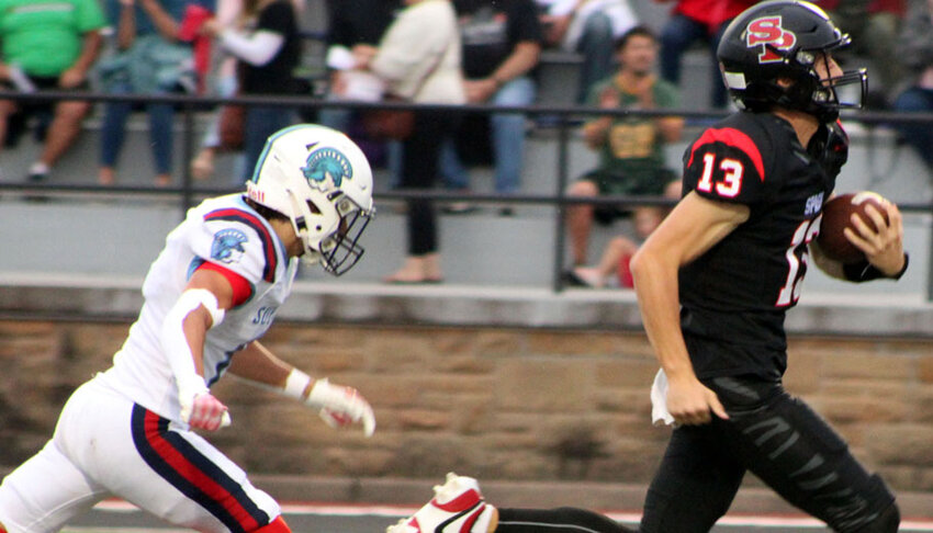 Grant Chandonis outruns Superior's Liam Flores to score the first touchdown in Stevens Point's 43-0 win Aug. 29..Greg Seubert Photo