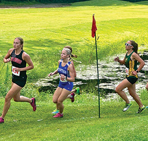 Peshtigo’s Rachel Nelson rounds a corner at the Freedom CC Invite.