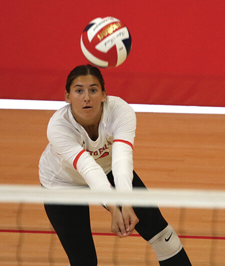 O. Falls’ Hailyn St. Louis digs up a kill attempt during the Beast of the Northeast Tournament in Appleton.