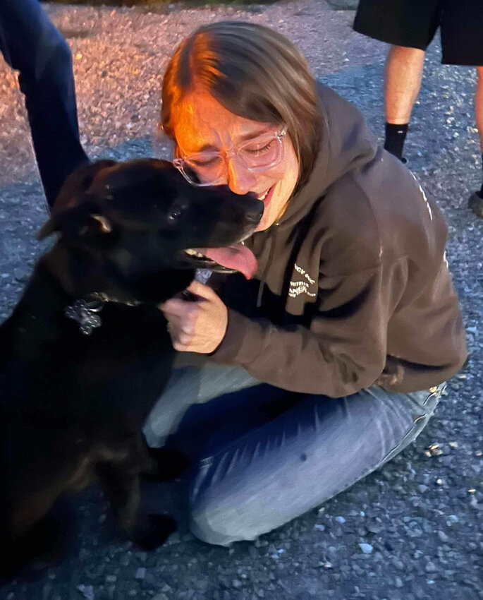 Lucy and owner, Katrina, are reunited after Get Toby Home assisted in locating Lucy by creating signs and fliers.