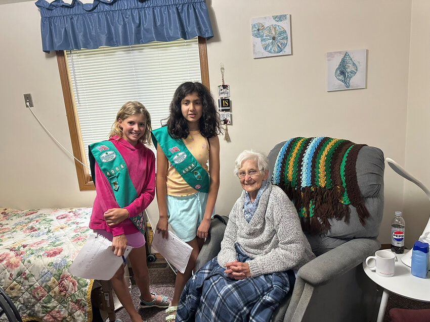 When Christina Connery and McKenzie Will of Junior Girl Scout Troop 4064 needed a project to earn their Bronze Award, McKenzie proposed the idea of visiting residents in assisted living facilities.