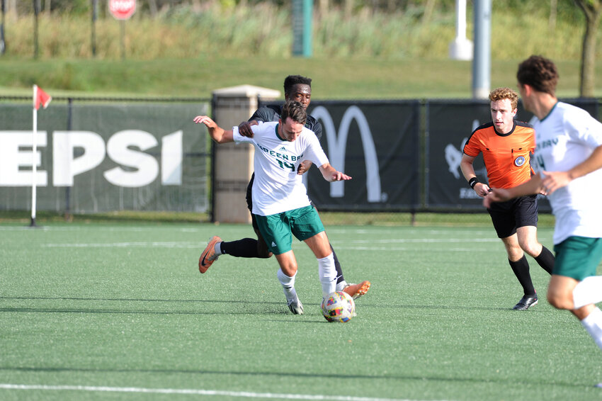 Phoenix Senior Forward Josh Johansen takes the ball up the field in their 1-0 win against Chicago State.