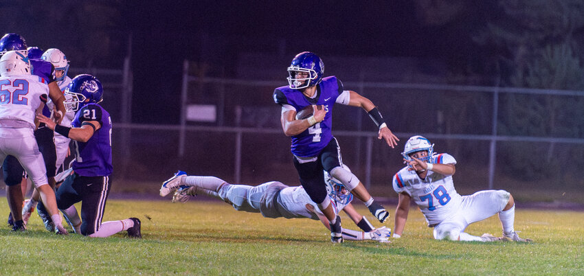 Chase MacGregor made two Southern Door defenders miss on his way to a handful of yards on this play Friday night.