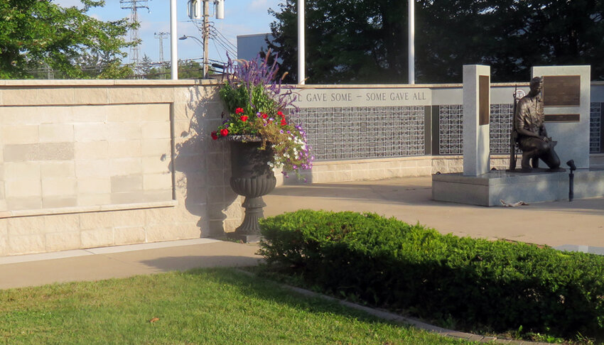 The wall addition at the Clintonville Veterans Memorial is currently delayed as the city waits for a shipment of black granite from India..Bert Lehman Photo