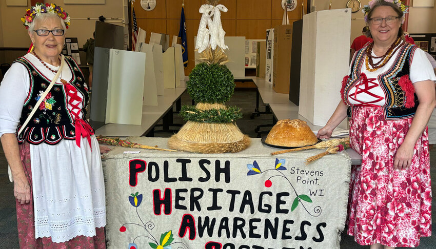 Portage County’s Polish heritage was celebrated Saturday and Sunday, Sept. 14-15, at the Dozynki Harvest Fest in downtown Stevens Point.  Shown, from left, are Gayle Phillip, president of the Polish Heritage Awareness Society, and lClara Baker. .Olivia Coffin Photo