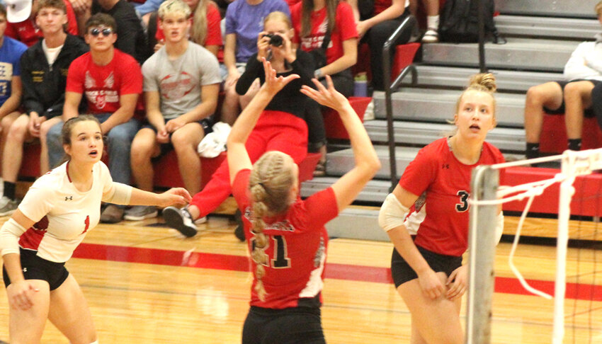 #21 Riley Delwiche sets up her teammates against the Menominee Indian Eagles.Nick Griesbach Photo