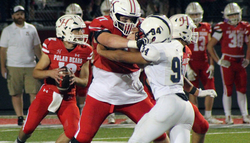 Offensive Lineman Peyton Dreifuerst pass protects for the Polar Bears on Friday, Sept. 20..Nick Griesbach Photo