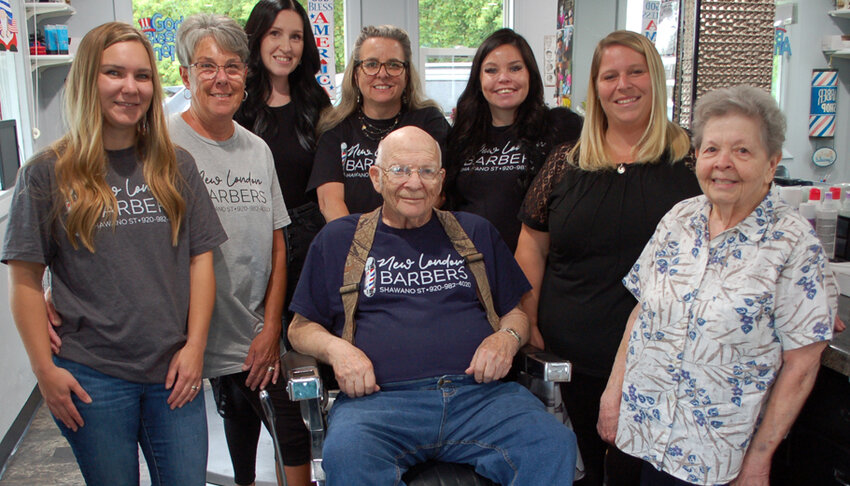 Staff at New London Barbers from left FRONT: former owners of Curt’s Barber and Beauty, Curt and Marilyn Sommer; BACK: Jackie Thompson, Sue Wilhite, Ellen Hackbarth, Karin Ison, Valerie Kudick and Kristin Sonheim. Not pictured is Louise Kabe who recently retired..John Faucher Photo.