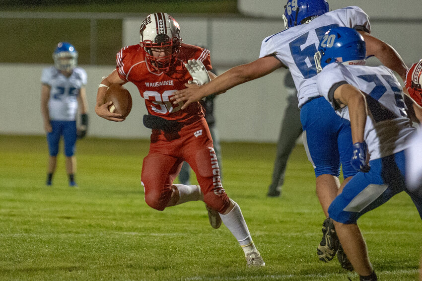 Luke Smith runs right past a Three Lakes defender on Friday as the Rangers took control of the game early and never looked back.