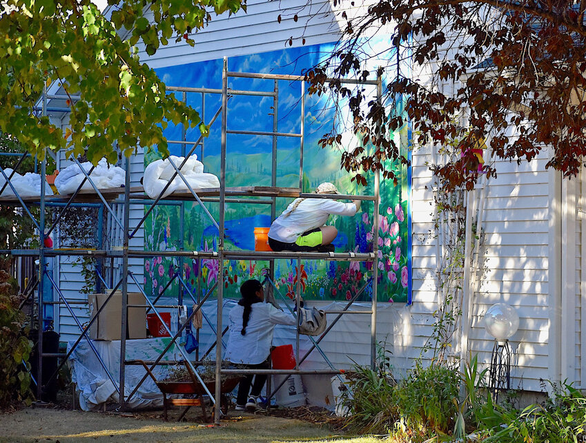 Algoma's newest mural was a joint venture between Isabella Rodriguez Toro of Cottage Grove and her sister-in-law, Karina Rodriguez Toro. The large painting was done for Karina's grandmother, Tina Marie, on the west side of Tina Marie's Boutique, 625 4th Street.