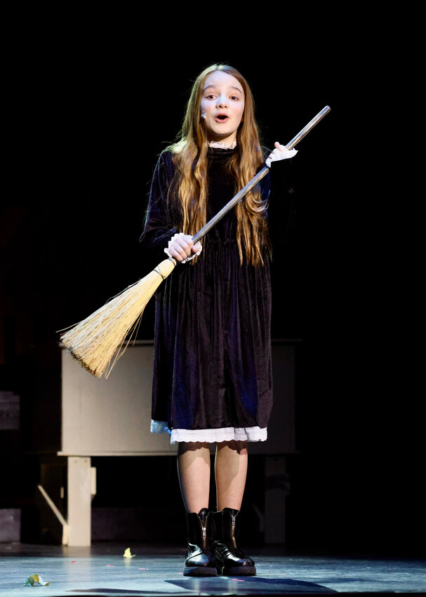 Sophia Volpe sings a song during her performance.