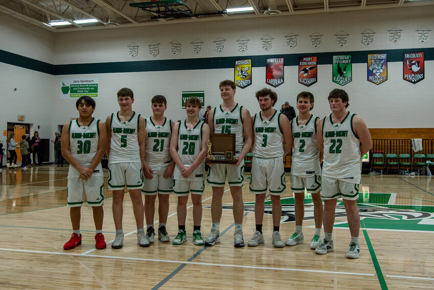 The Almond-Bancroft Eagles pose with their Central Wisconsin South Conference Championship  trophy. (L to R): Malachi Ramirez, Karson Garner, Tucker Stiles, .Cohen Preissner, Ayden Phillips, Clarence Pratt, Brody Dernbach, and Emmitt Stiles.