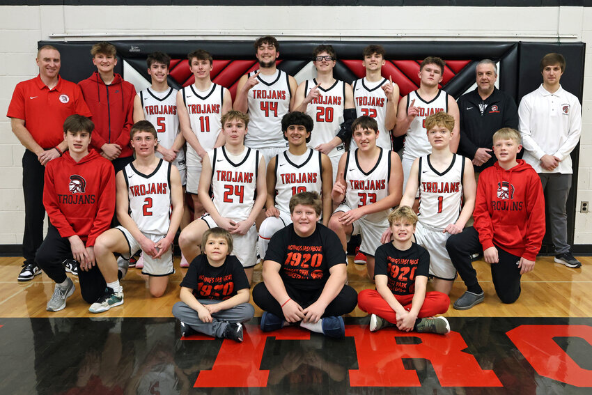 Forest Park Basketball Team. Pictured are, back row from left, Jason Price (Coach), Jon Giuliani (Manager), Izaiah Tarter, Dax Huuki, Kevin Giuliani, Matt Showers, Vic Giuliani, Trent Kannich, Jeff Hagglund (Volunteer Coach) and Dawson Ponchaud (JV Coach). Middle row, from left, Lyle Price (Manager), Dietrich Rasner, Aiden Waldo, Gabe Quevedo, Eli Brzoznowski, Noah Starr and Isaac Williams (Manager). Front row, from left, Managers: Jordan Hahn, Mack Anderson and Lee Price.