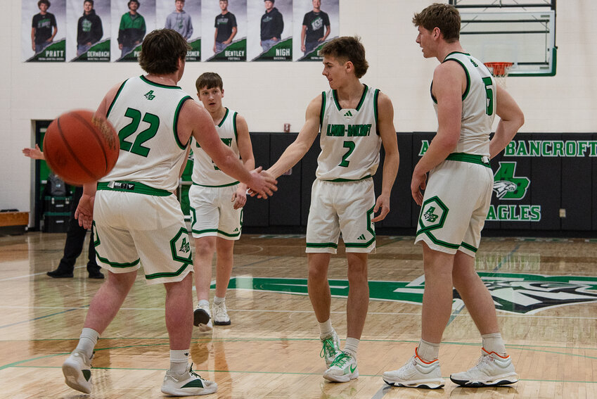 Brody Dernbach gets some encouragement from his teammates between free throws.