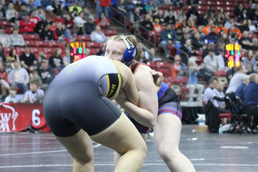 Merin Yates wrestling Mackenzie Stanton from New Berlin in her first match.