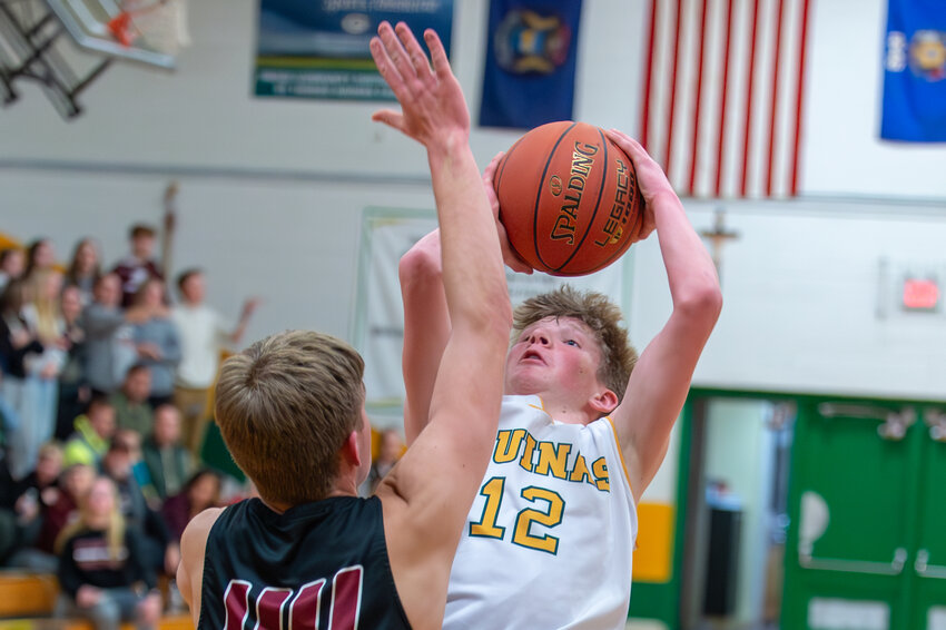 St. Tomas Aquinas Academy kept shooting as they fell behind in Friday night's game against Elkhart Lake/Glenbeulah.