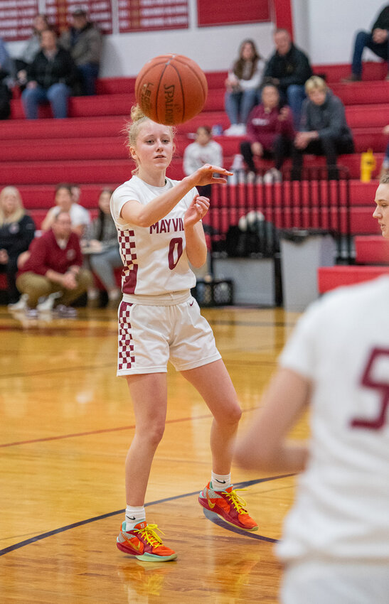 Madison Justman advances the ball up the court.
