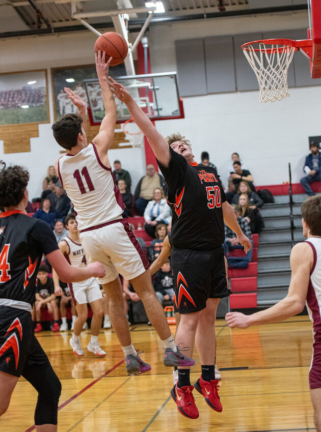 Talan Meyer elevates for a shot over a North Fond du Lac defender.