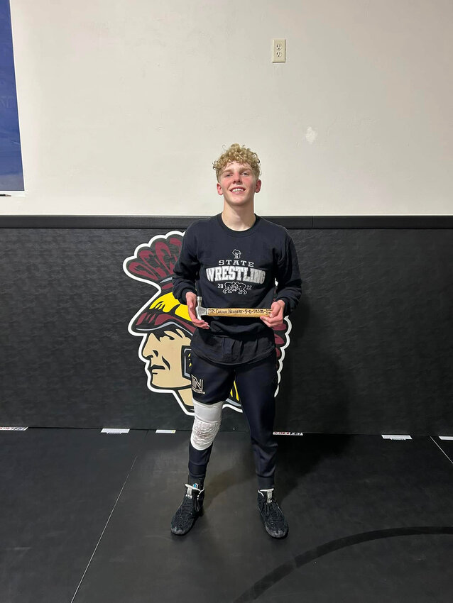 Carson Neubert, winner of the 126-pound Division-1 championship.