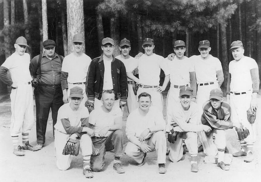 Pictured, back row, from left: Barry Young, Dick Collins (umpire), Carl Bartz, Joe Obey, Irv Bartz, Joe Kahle, Lornie Krueger, Dick Kahle, Delmar Kluball; front: Jim Pickett, Norm Kahle, Herb Madlung, Elton Obey, Dick Van Strydonk.