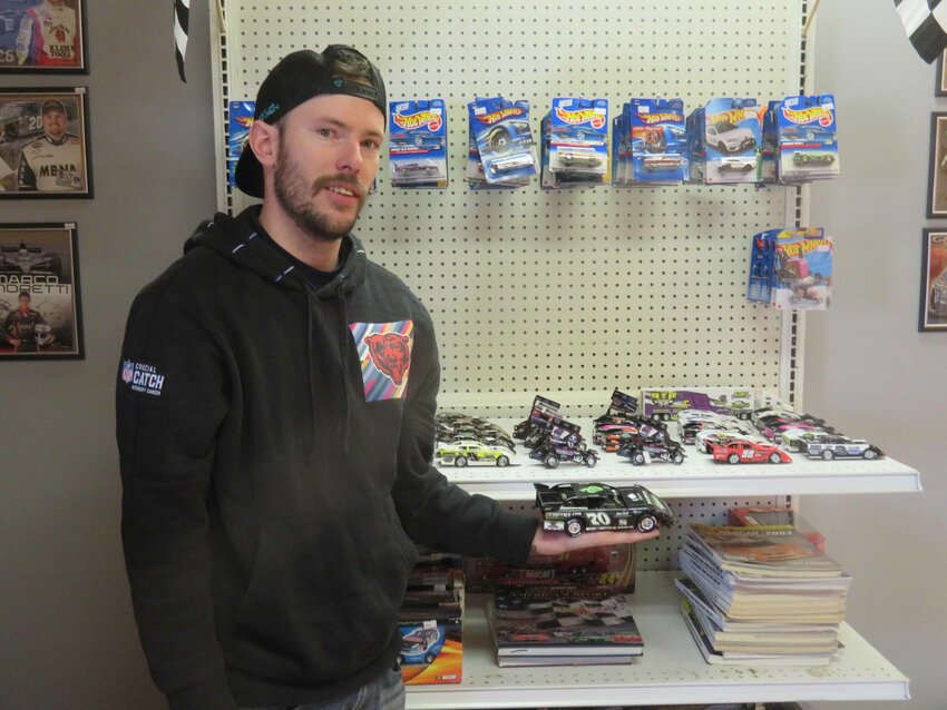 Nate O’ Bright, owner of Victory Lane Die-Cast, LLC in New London, offers customers a variety of NASCAR die-cast race cars, as well as die-casts of drivers who race locally. 
Bert Lehman Photo