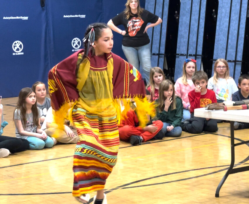 Piper Pullium dances for her classmates the way she dances at pow wows.