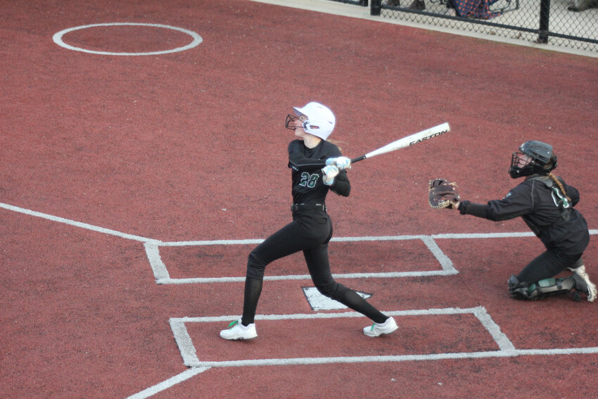 Julia Prochnow sends up an infield fly against KML.